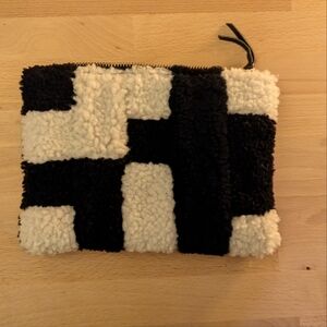 Primecut zipper pouch black and white checker shearling